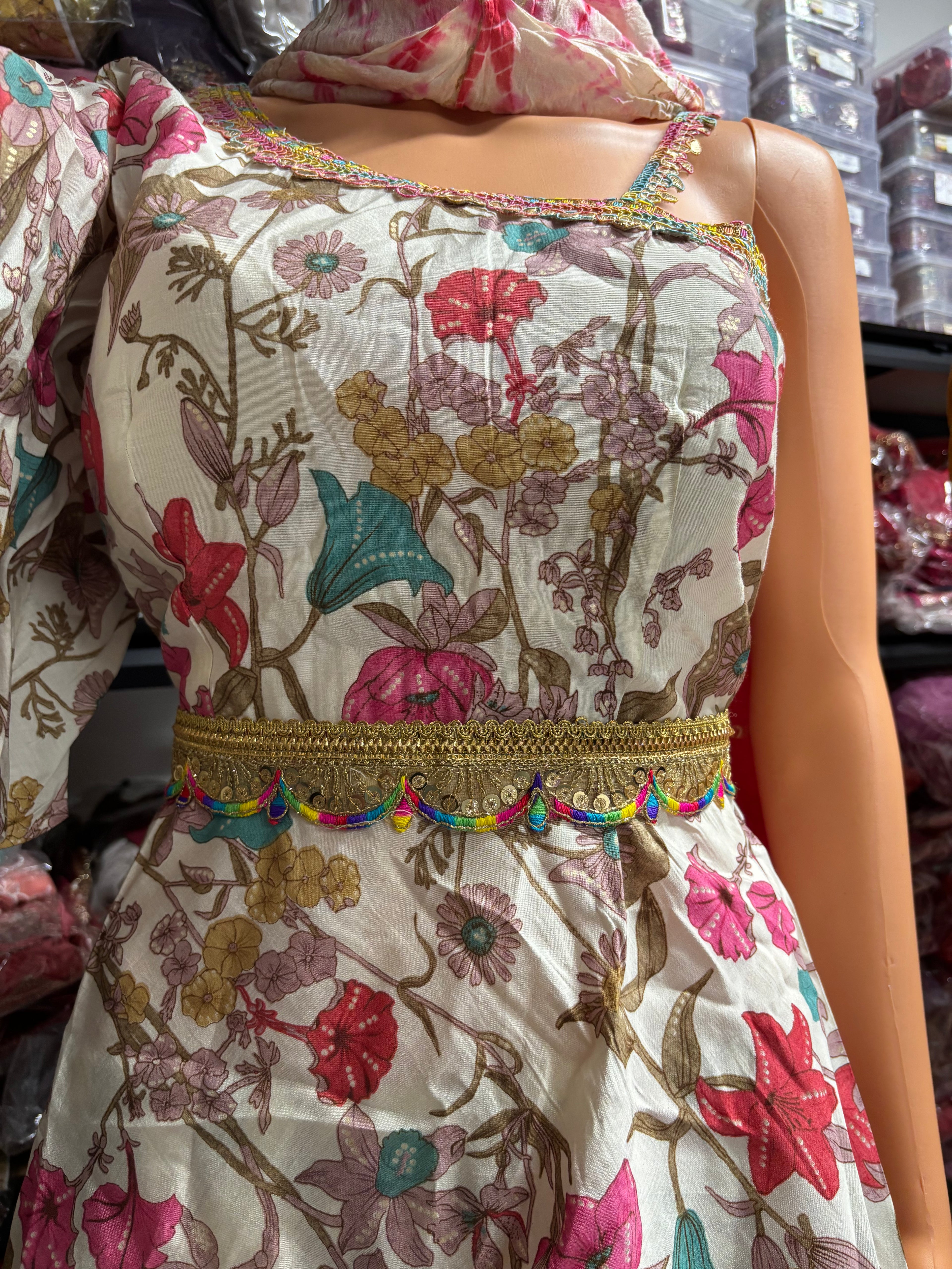 Elegant 3-piece kurta palazzo set featuring asymmetrical sleeves for a modern twist on traditional wear