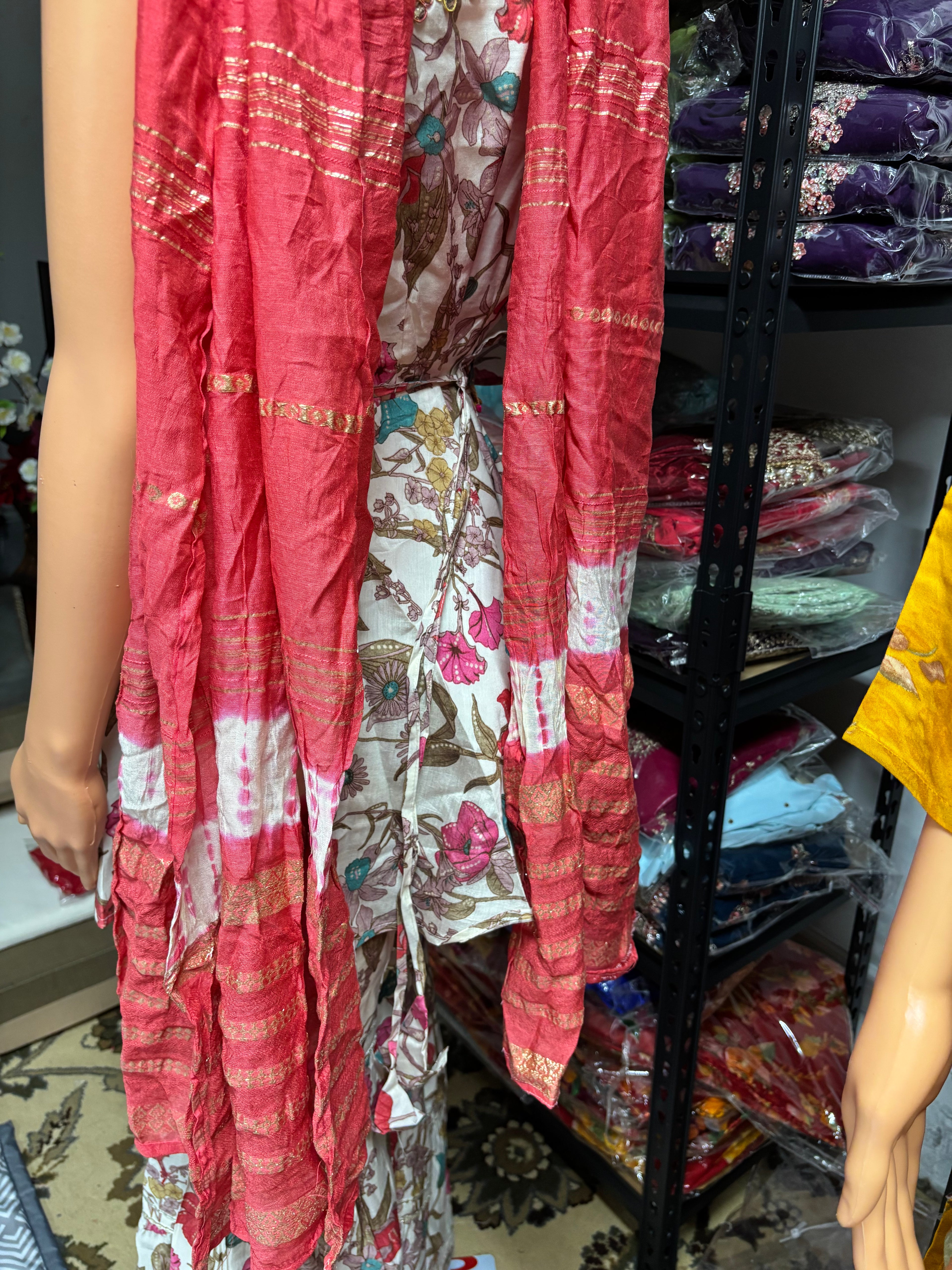 Elegant 3-piece kurta palazzo set featuring asymmetrical sleeves for a modern twist on traditional wear