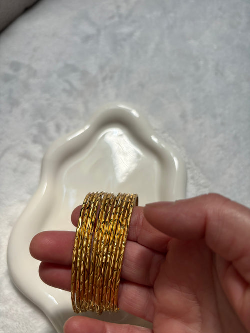 12 Pices Of Gold Plated Golden Bangles